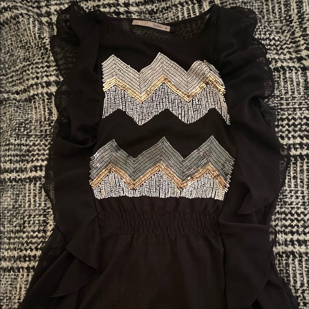 Stunning top, classy and quality! Size M = 38